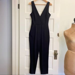 Super Sexy Black Faux Wrap Jumpsuit | Size 6